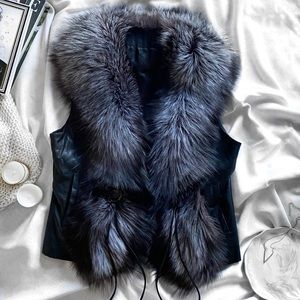 Vintage genuine leather vest with front rabbit fur panels. Size S.